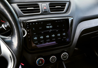 Подержанный автомобиль Kia Rio Sedan 2015 года (11 фото)