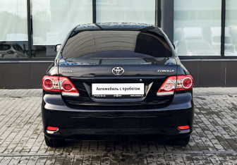 Подержанный автомобиль Toyota Corolla Sedan 2010 года (4 фото)