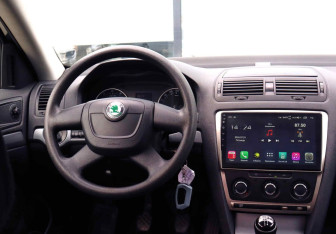 Подержанный автомобиль Skoda Octavia Liftback 2011 года (17 фото)
