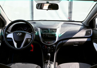 Подержанный автомобиль Hyundai Solaris Sedan 2010 года (16 фото)