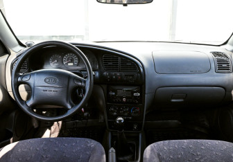 Подержанный автомобиль Kia Spectra Sedan 2007 года (12 фото)