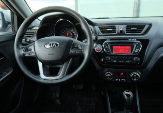 Подержанный автомобиль Kia Rio Sedan 2014 года (10 фото)