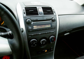 Подержанный автомобиль Toyota Corolla Sedan 2010 года (10 фото)