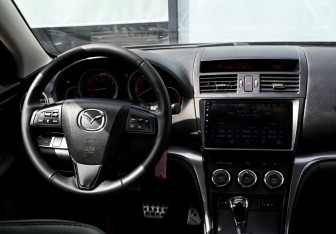 Подержанный автомобиль Mazda 6 Sedan 2010 года (19 фото)