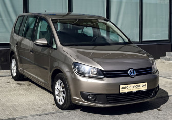 Подержанный автомобиль Volkswagen Touran 2012 года (7 фото)
