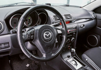 Подержанный автомобиль Mazda 3 Sedan 2008 года (10 фото)