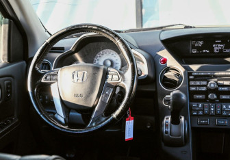 Подержанный автомобиль Honda Pilot 2013 года (18 фото)