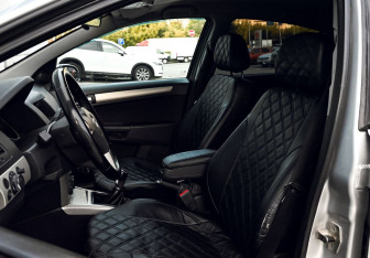 Подержанный автомобиль Opel Astra Sedan 2008 года (16 фото)
