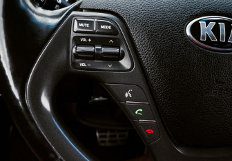 Подержанный автомобиль Kia Cerato Sedan 2013 года (14 фото)