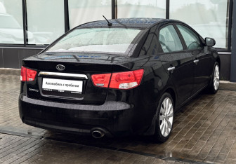 Подержанный автомобиль Kia Cerato Sedan 2011 года (5 фото)