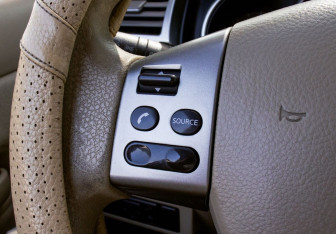 Подержанный автомобиль Nissan Tiida Hatchback 2007 года (13 фото)