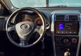 Подержанный автомобиль Toyota Corolla Sedan 2008 года (19 фото)