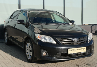 Подержанный автомобиль Toyota Corolla Sedan 2012 года (7 фото)