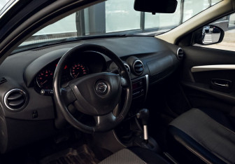 Подержанный автомобиль Nissan Almera Sedan 2013 года (12 фото)