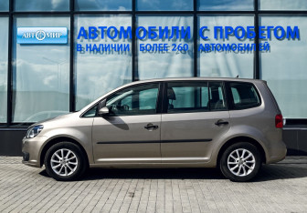 Подержанный автомобиль Volkswagen Touran 2012 года (2 фото)