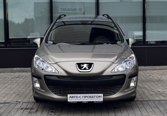 Подержанный автомобиль Peugeot 308 Wagon 2010 года (8 фото)