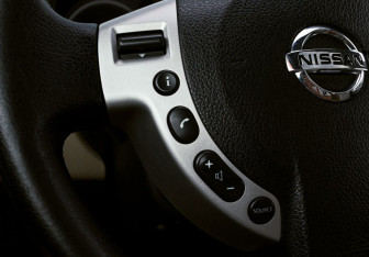 Подержанный автомобиль Nissan X-Trail 2010 года (14 фото)