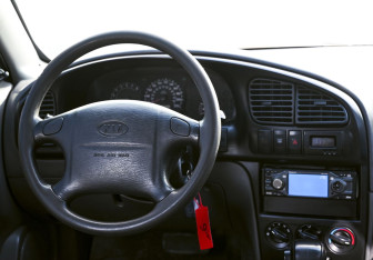 Подержанный автомобиль Kia Spectra Sedan 2007 года (17 фото)