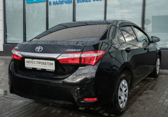 Подержанный автомобиль Toyota Corolla Sedan 2013 года (5 фото)