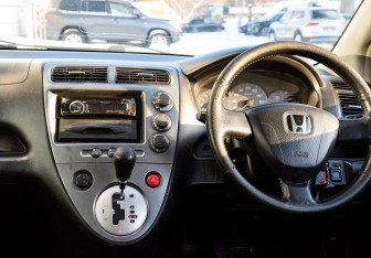 Подержанный автомобиль Honda Civic Hatchback 2003 года (10 фото)
