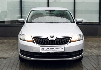 Подержанный автомобиль Skoda Rapid Liftback 2014 года (8 фото)