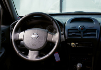 Подержанный автомобиль Nissan Almera Classic 2007 года (17 фото)