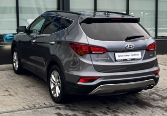 Подержанный автомобиль Hyundai Santa Fe 2016 года (3 фото)