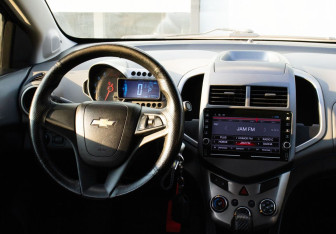 Подержанный автомобиль Chevrolet Aveo Sedan 2013 года (17 фото)