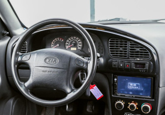 Подержанный автомобиль Kia Spectra Sedan 2006 года (11 фото)