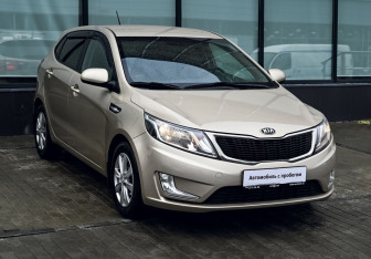 Подержанный автомобиль Kia Rio Hatchback 2014 года (7 фото)