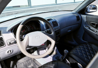 Подержанный автомобиль Hyundai Accent Sedan 2011 года (13 фото)