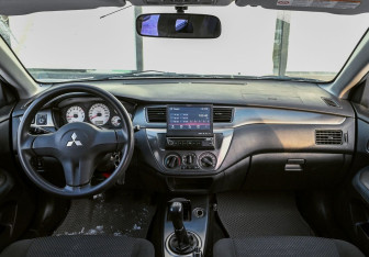 Подержанный автомобиль Mitsubishi Lancer Wagon 2007 года (12 фото)