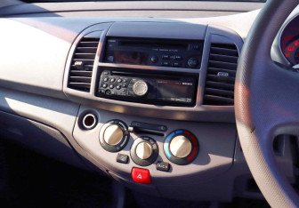Подержанный автомобиль Nissan March Hatchback 2002 года (10 фото)