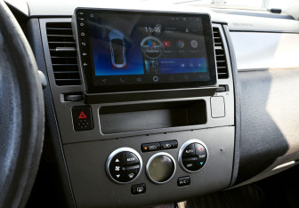 Подержанный автомобиль Nissan Tiida Hatchback 2008 года (14 фото)