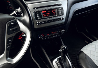 Подержанный автомобиль Kia Rio Sedan 2016 года (9 фото)
