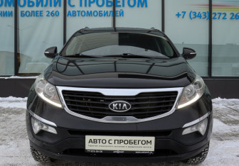 Подержанный автомобиль Kia Sportage 2010 года (8 фото)