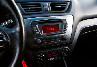 Подержанный автомобиль Kia Rio Hatchback 2013 года (10 фото)