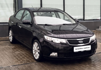 Подержанный автомобиль Kia Cerato Sedan 2011 года (7 фото)