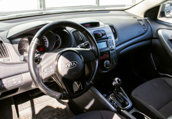Подержанный автомобиль Kia Cerato Sedan 2012 года (13 фото)
