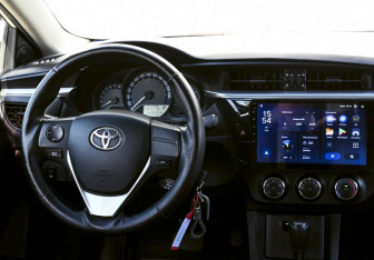 Подержанный автомобиль Toyota Corolla Sedan 2013 года (18 фото)