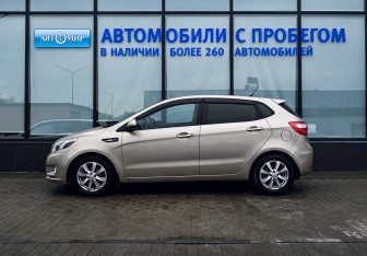 Подержанный автомобиль Kia Rio Hatchback 2014 года (2 фото)