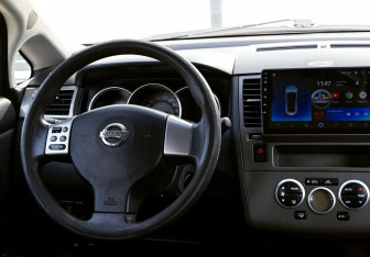 Подержанный автомобиль Nissan Tiida Hatchback 2008 года (11 фото)