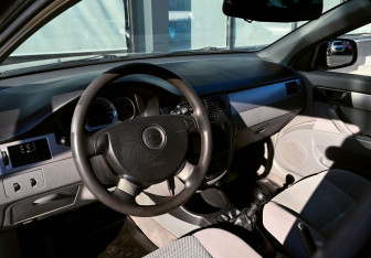 Подержанный автомобиль Chevrolet Lacetti Sedan 2010 года (13 фото)