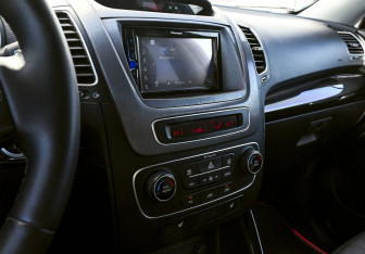 Подержанный автомобиль Kia Sorento 2013 года (11 фото)