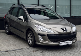 Подержанный автомобиль Peugeot 308 Wagon 2010 года (7 фото)
