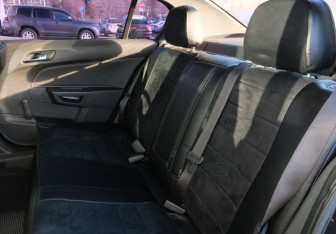 Подержанный автомобиль Opel Astra Sedan 2011 года (17 фото)