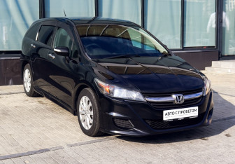 Подержанный автомобиль Honda Stream 2010 года (7 фото)
