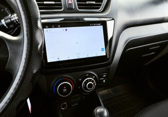 Подержанный автомобиль Kia Rio Sedan 2012 года (13 фото)