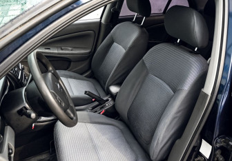 Подержанный автомобиль Nissan Almera Classic 2010 года (13 фото)