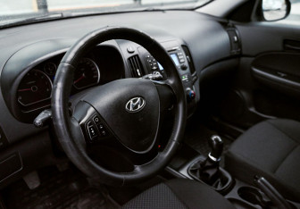Подержанный автомобиль Hyundai i30 Hatchback 2010 года (14 фото)